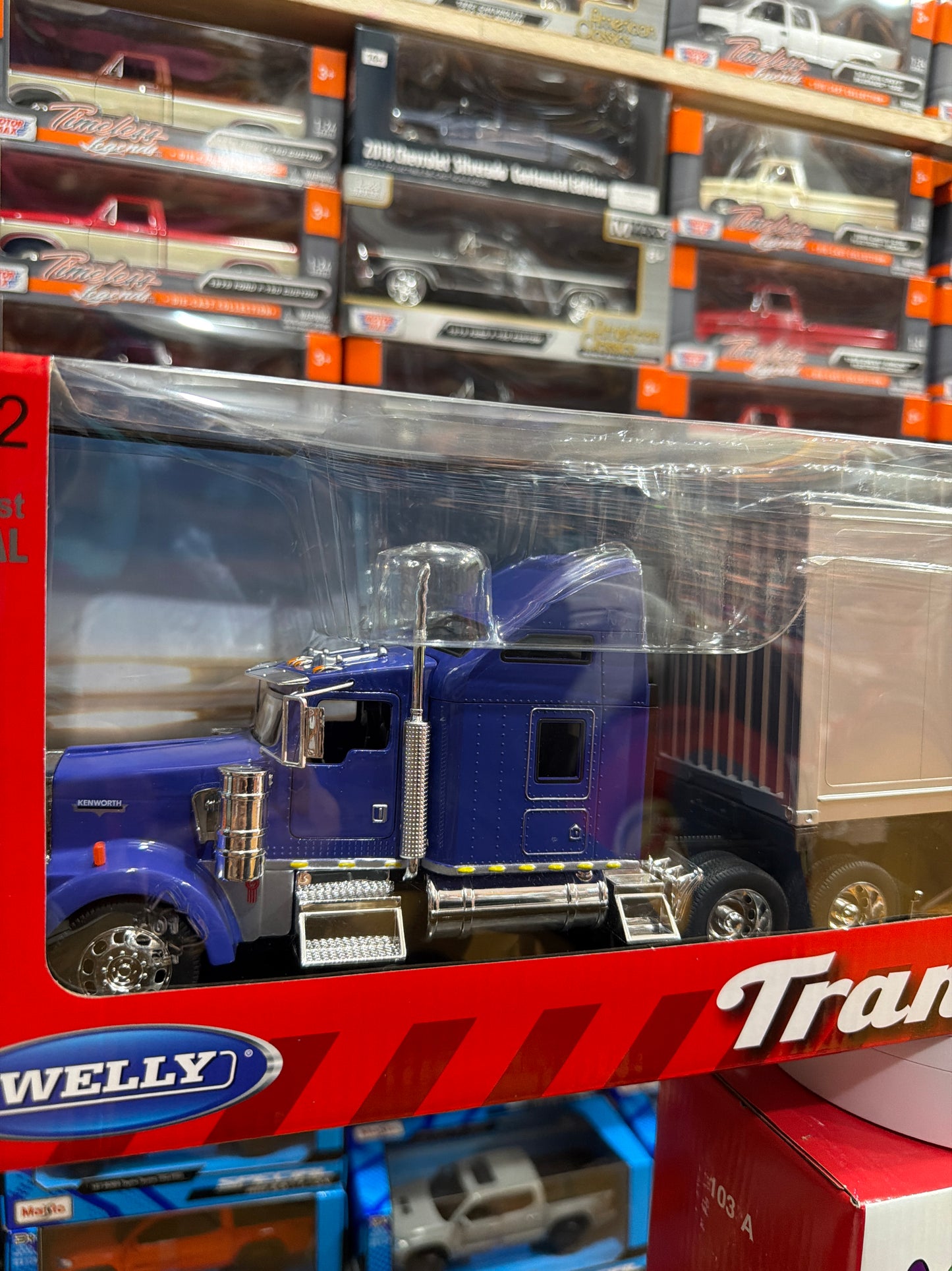 Welly Kenworth KW900 Escala 1:32 Azul con Tráiler Plateado