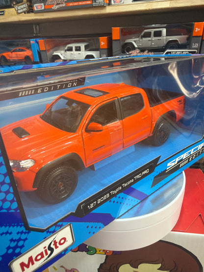 Tacoma Trd Pro 2023 Orange escala 1:27